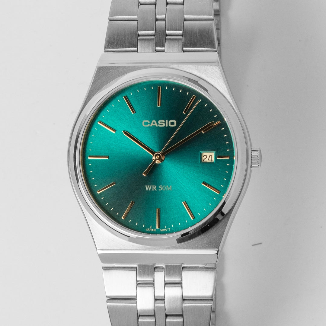 Casio Men’s Teal Dial Stainless Steel Watch MTP-B145D-2A1V – Slim Profile, 50M Water Resistant