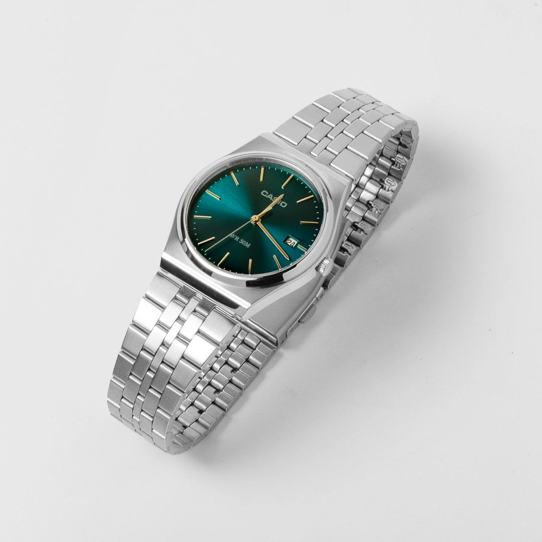 Casio Men’s Teal Dial Stainless Steel Watch MTP-B145D-2A1V – Slim Profile, 50M Water Resistant