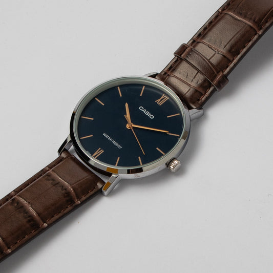 Casio Men’s Slim Blue Dial Watch MTP-VT01GL – Brown Leather Strap, Minimalist Style