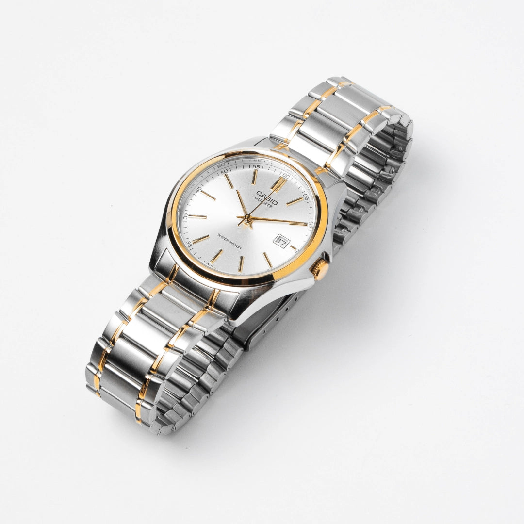 Casio Men’s Two-Tone Stainless Steel Watch MTP-1183G-7A – Classic Business Style